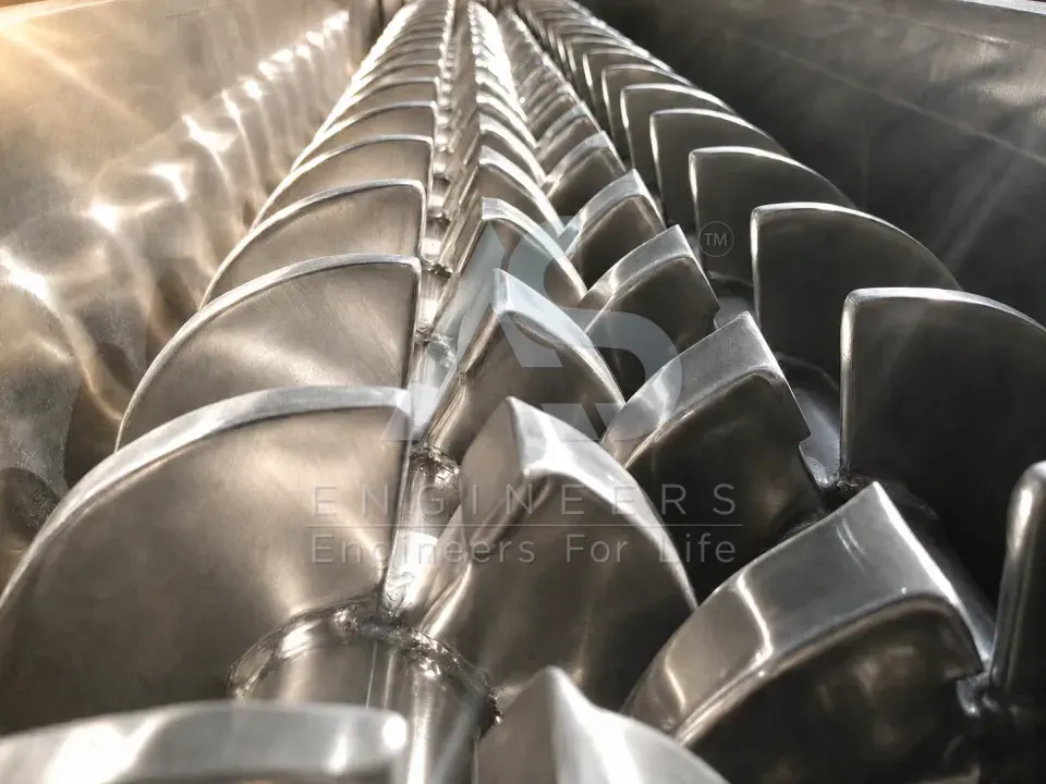 Hollow wedge-shaped paddles on dual counter-rotating shafts